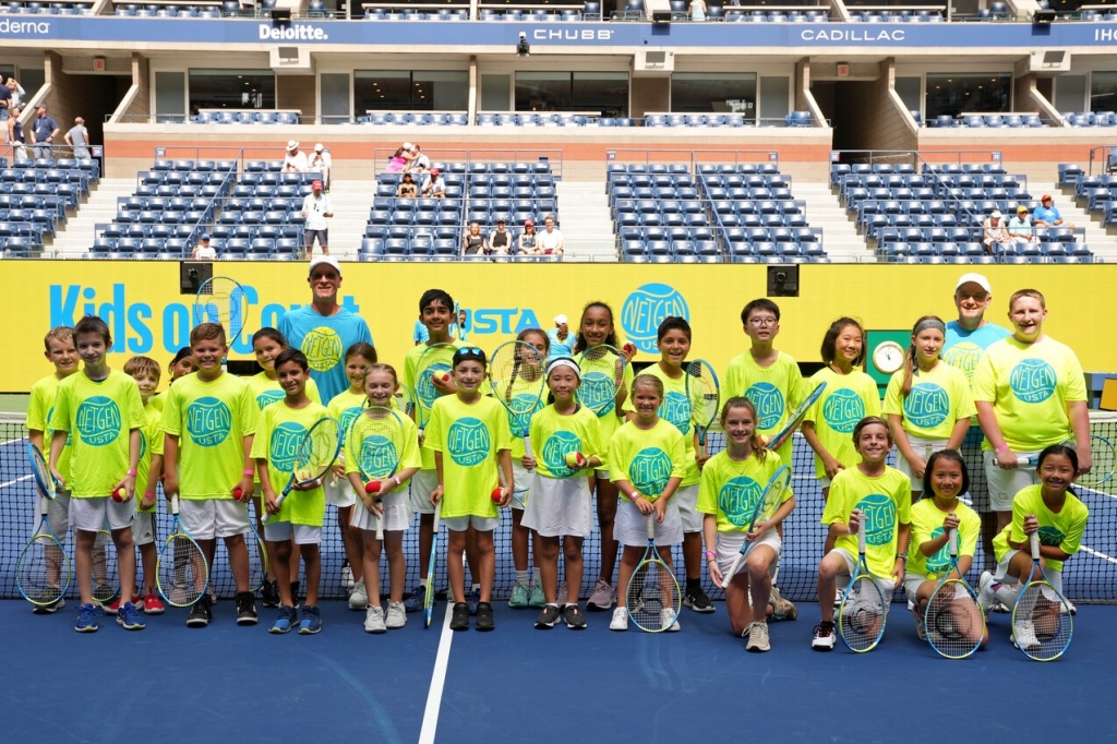 young-area-tennis-players-perform-on-arthur-ashe-stadium