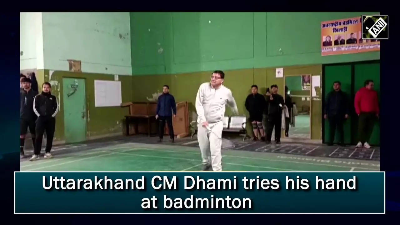 uttarakhand-cm-dhami-tries-his-hand-at-badminton-–-times-of-india